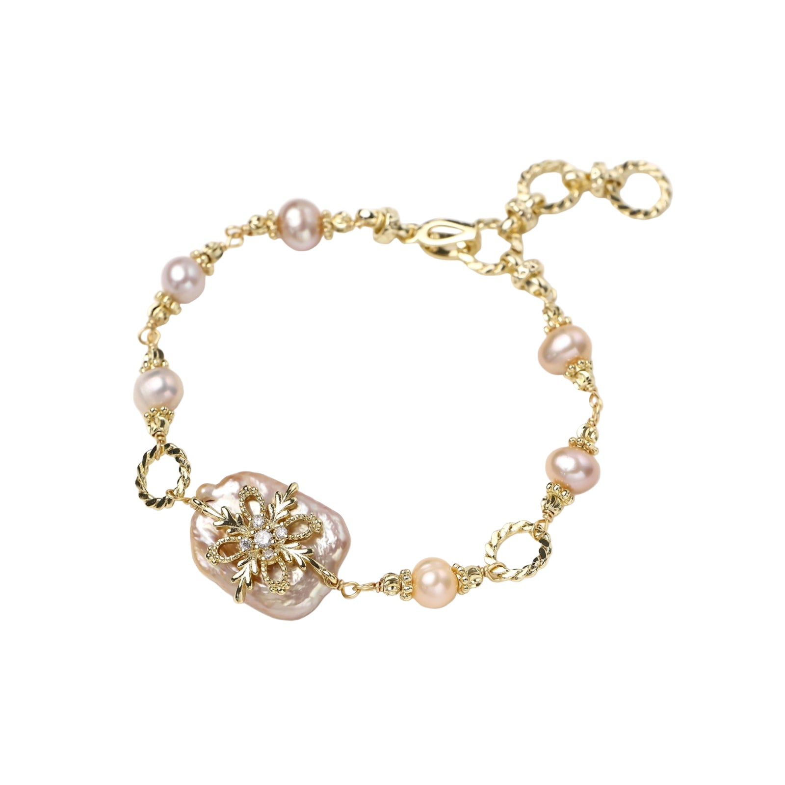 Gold-plated bracelet with pink baroque pearl centerpiece, floral connector, and freshwater pearls
