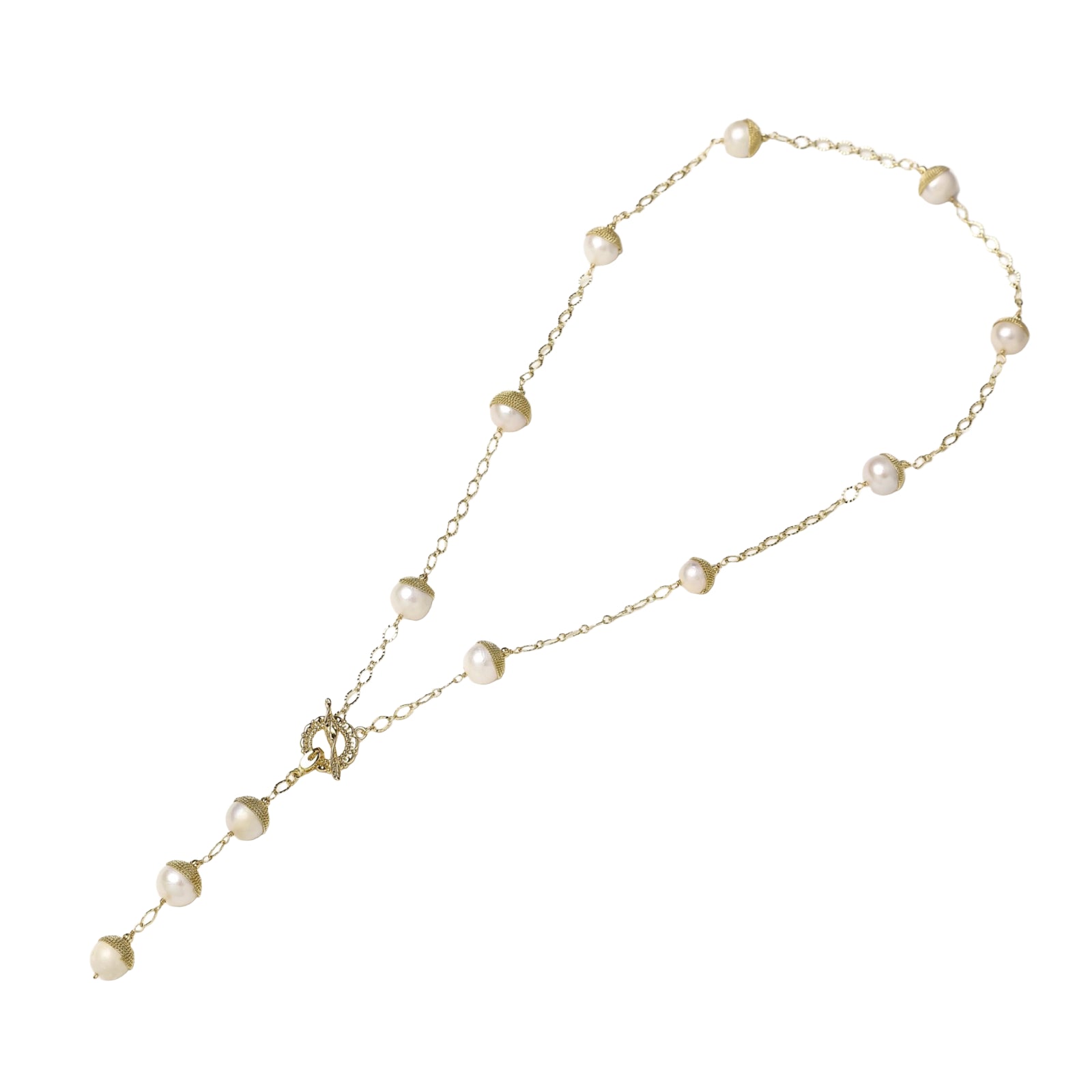 Gold-plated lariat necklace with baroque pearls and textured caps on cream background, showing adjustable Y-shaped design.